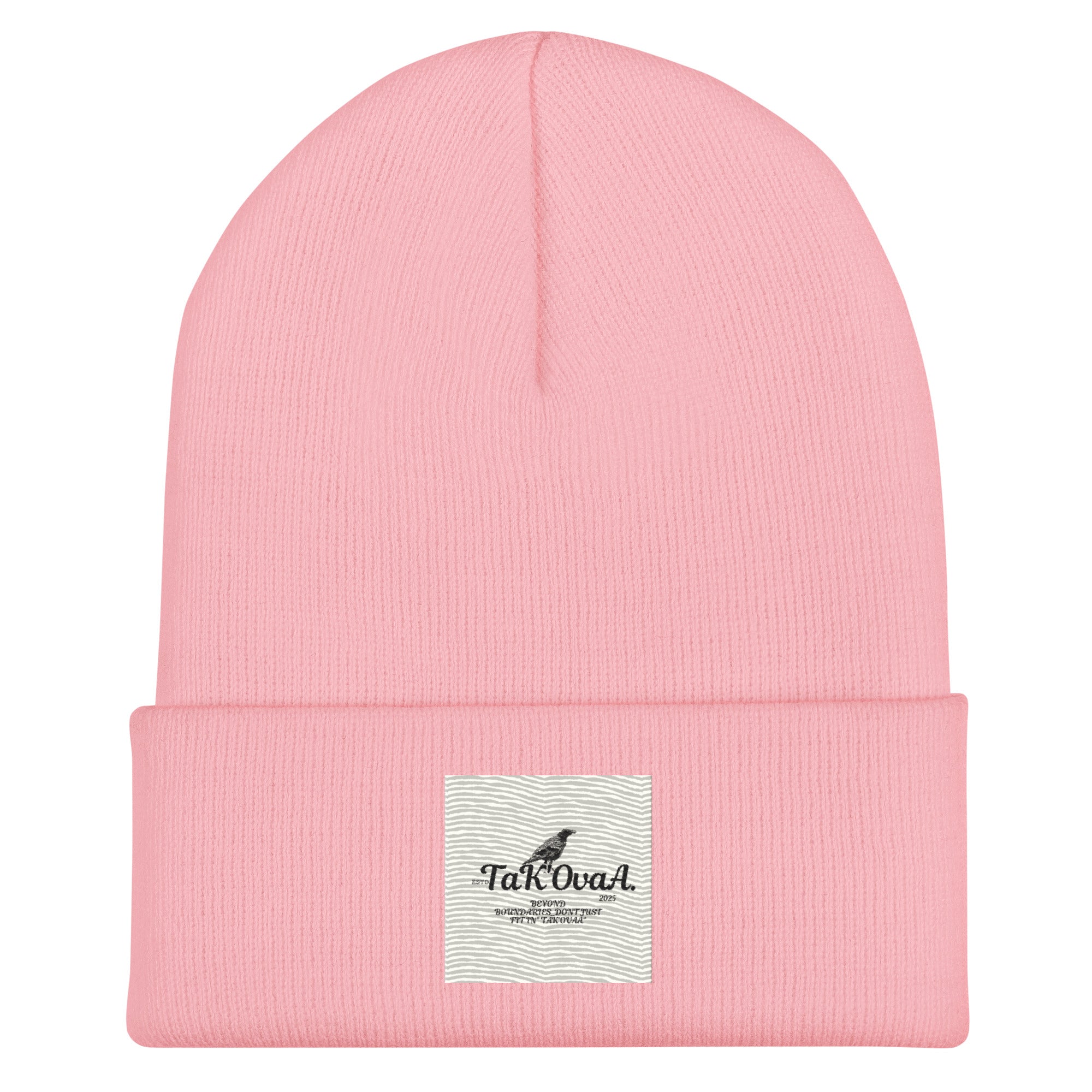 Pink beanie with a label on a white background